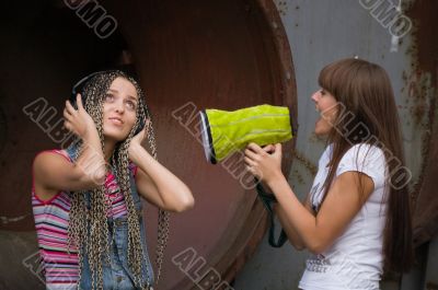 girl singing for another