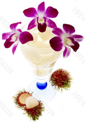Rambutan with fruit juice and orchid Rambutan with fruit juice and orchid