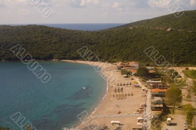 beach alongside with mountains