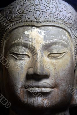 Asian statue facial closeup