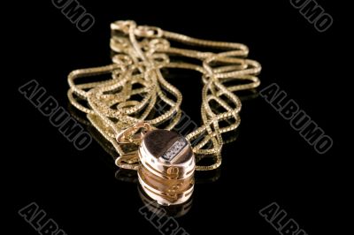 Golden chain on black close up