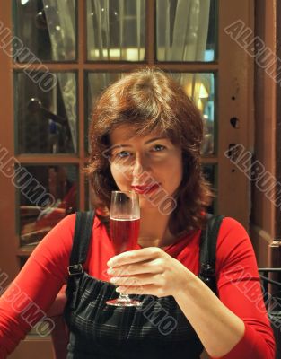 Young woman drinking wine