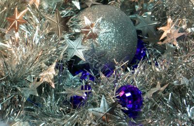 Silver and purple cristmas balls and stars garlands