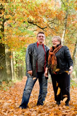 Happy older couple in the autumn