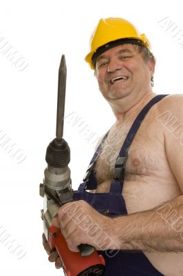 Worker with drilling machine and safety helmet
