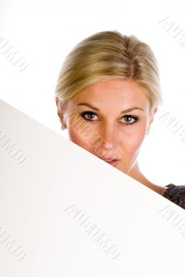 pretty woman holding a blank over white background