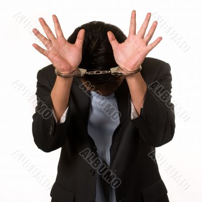 Ashamed man in handcuffs