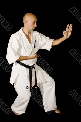 Karateka men is posing