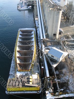 large dirt barge being filled up large dirt barge being filled up
