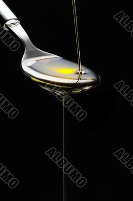olive oil on a spoon