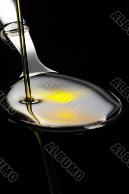 olive oil on a spoon