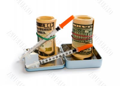 A roll of dollars with syringe