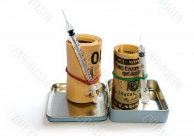 A roll of dollars with syringe