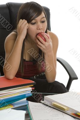 Female student when studying with apple