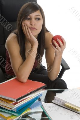 Female student when studying with apple