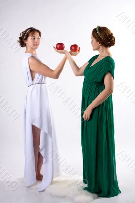 Two ladies and two apples