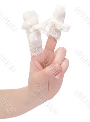 Hand with the bandaged, wounded fingers