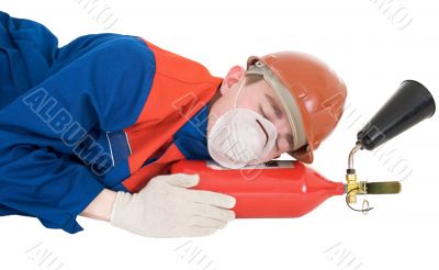 Sleeping laborer with fire extinguisheron