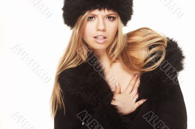 Woman in black fur hat and coat
