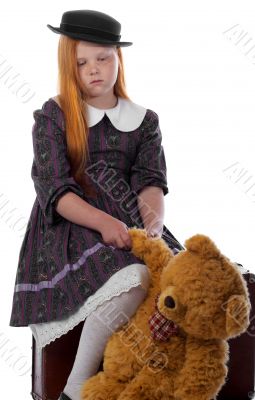 Sad travelling redhead girl