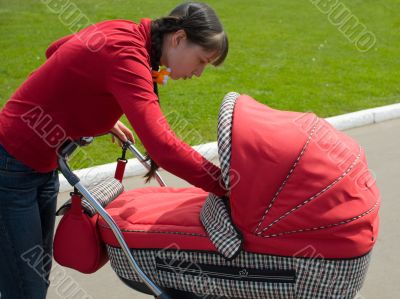 Woman with baby carriage