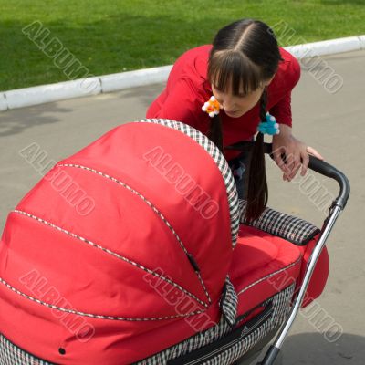 Woman with baby carriage