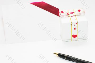 gift and letter with pen on the white background
