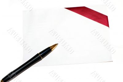 Diagonal red gift bow and blank card on white background