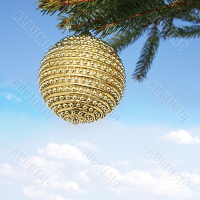 christmas bauble and blue sky