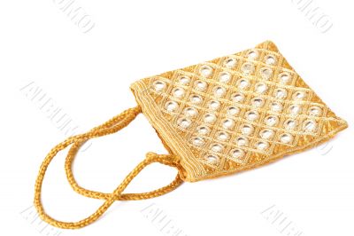 Beautiful gold bag with mirrors on white