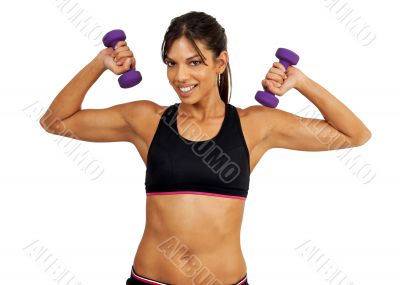 Beautiful brunette woman exercising