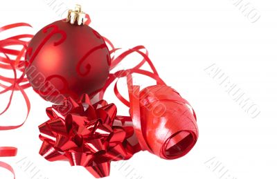 Red Christmas bauble with bow and ribbon