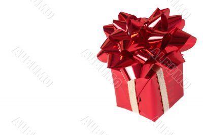 Red gift box with bow on white background