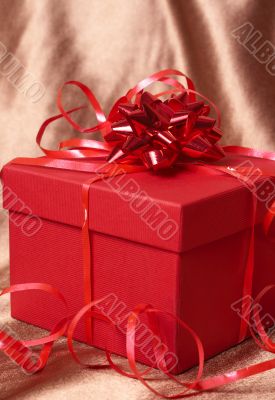 Red gift box with bows