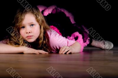 Ballet girl is laying down