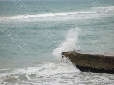 wave crashing on a dock wave crashing on a dock