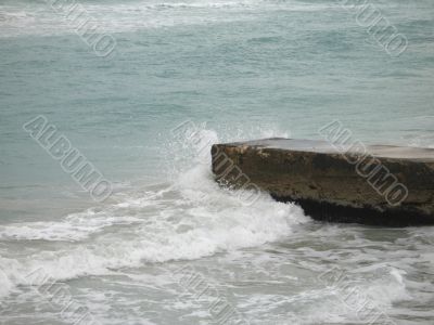 wave crashing on a dock wave crashing on a dock