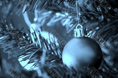 Christmas ornaments on tree.