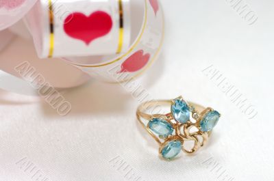 golden ring with blue topaz