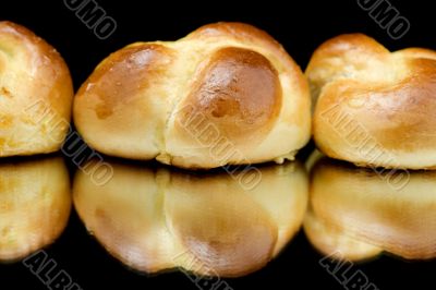 fresh small loaf on black closeup