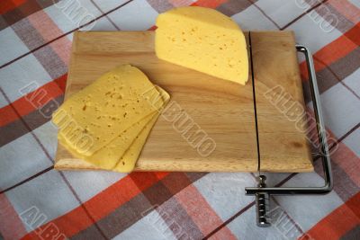 portion cheese on a wooden desk