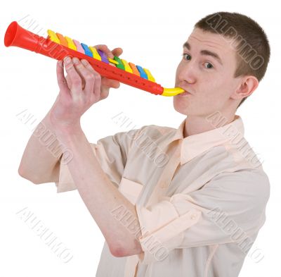 Young man and toy, trumpet