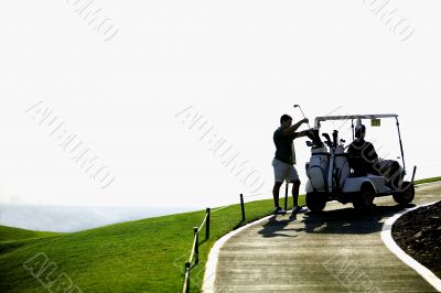 golfer and golf cart