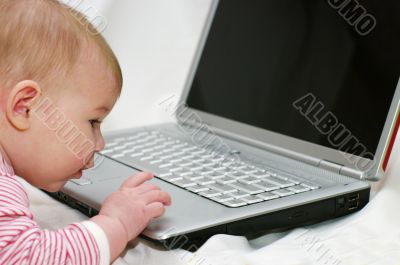 Baby working on Laptop