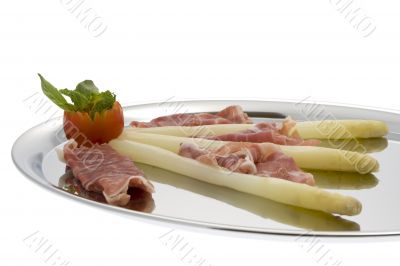 asparagus with parma hams on silver tray