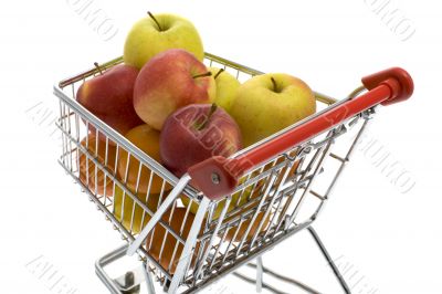 Shopping trolley with fruits, supermarket