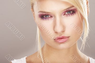 Girl wearing makeup made of flowers