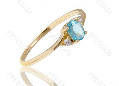 Golden ring with aqumarine