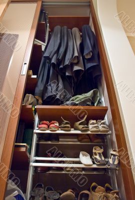 Home wardrobe with suits and shoes