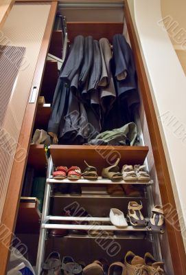 Home wardrobe with suits and shoes Home wardrobe with suits and shoes